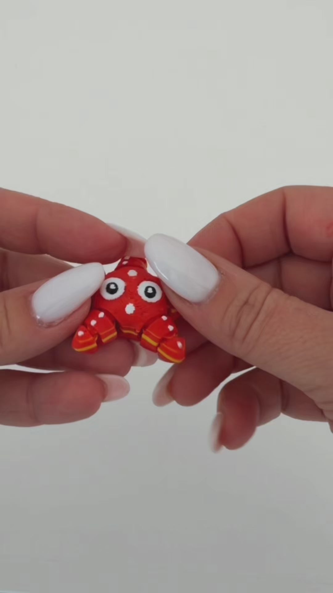 Carica il video: Video di fidget in movimento in uso.